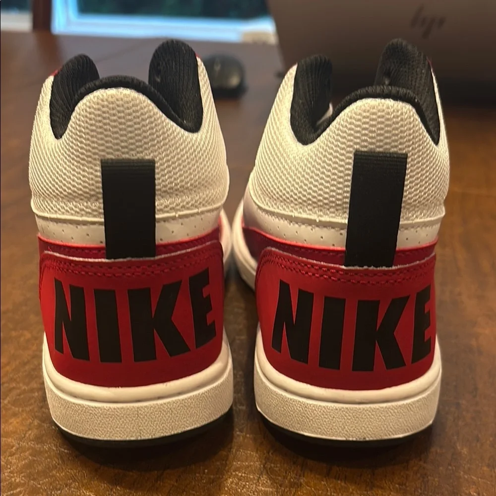 Boys Nike high top sneakers black red and white size 4 boys! Brand new